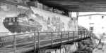 Black & White picture of wall covered with graffiti art and Black & White of a typical Beer of Hamburg - Argentinienbrücke Hamburg - Argentienbrücke Hamburg